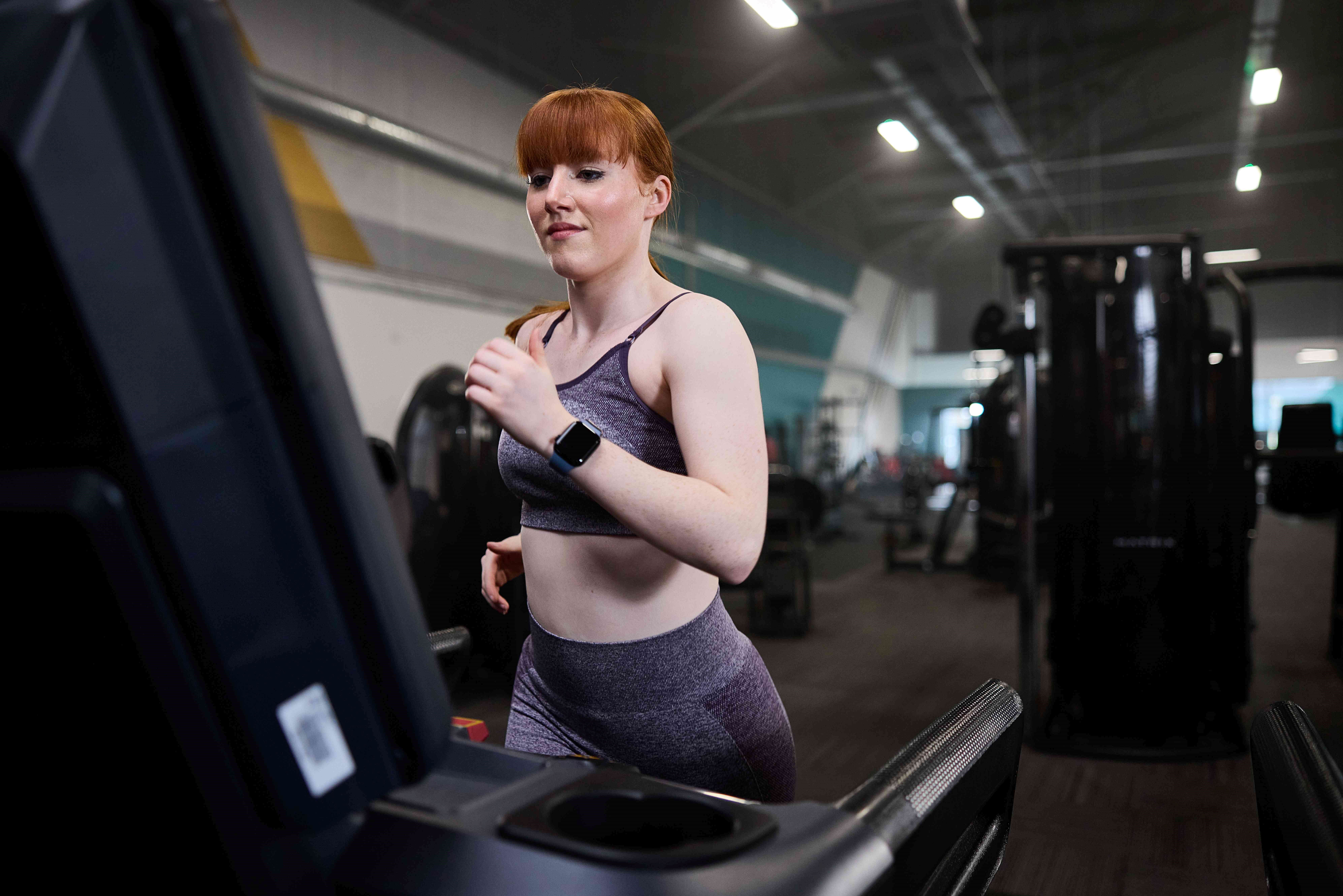 PureGym member using a treadmill