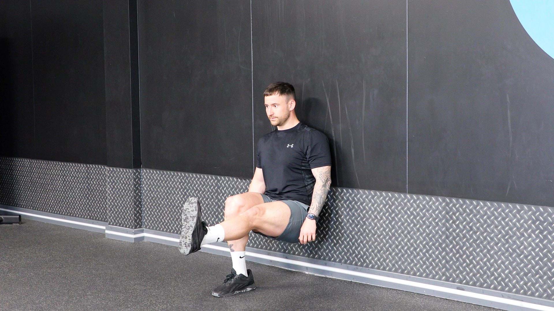 How To Do Wall Sits Wall Sit Variations PureGym How To Do Wall Sits Wall Sit Variations PureGym