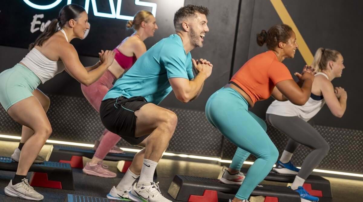PureGym members and instructor taking part in a Step class