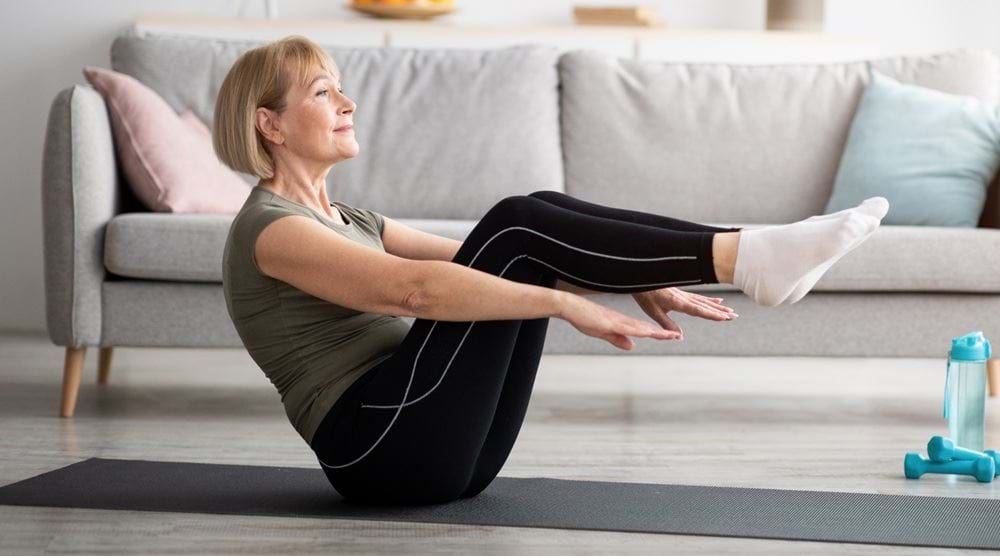 Lady performing core exercise